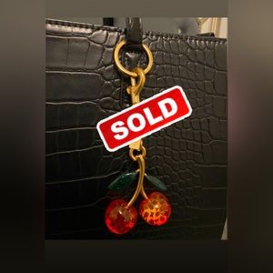 Coach cherry charm